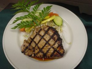 Grilled tuna steaks with cilantro and basil